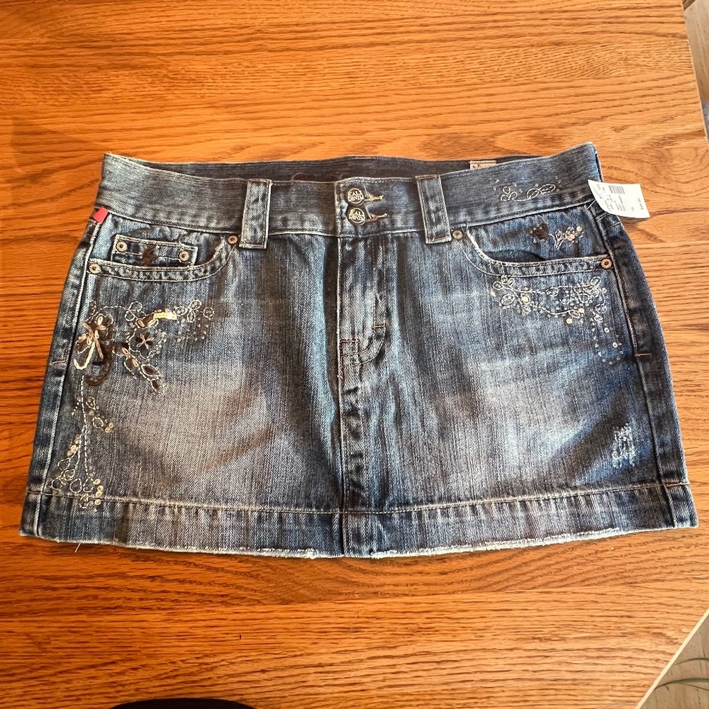 Denim Mini Skirt NWT Jr Sz 13. - distressed with jewels designs